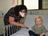 Dr Samantha Fairless with patient Freya East